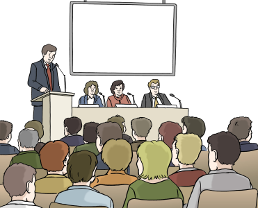Auf dem Bild halten mehrere Personen vorne eine Rede oder sprechen auf einer Veranstaltung – viele Menschen hören zu.