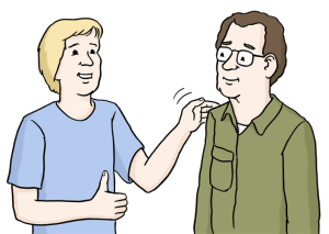 Auf dem Bild sieht man zwei Person, die eine klopft der anderen Person auf die Schulter. Als Lob.