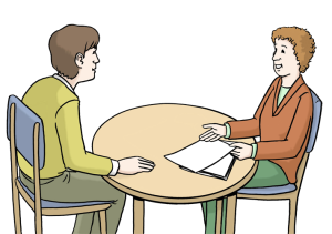 Das Bild zeigt zwei Personen bei einem Beratungsgespräch an einem runden Tisch.